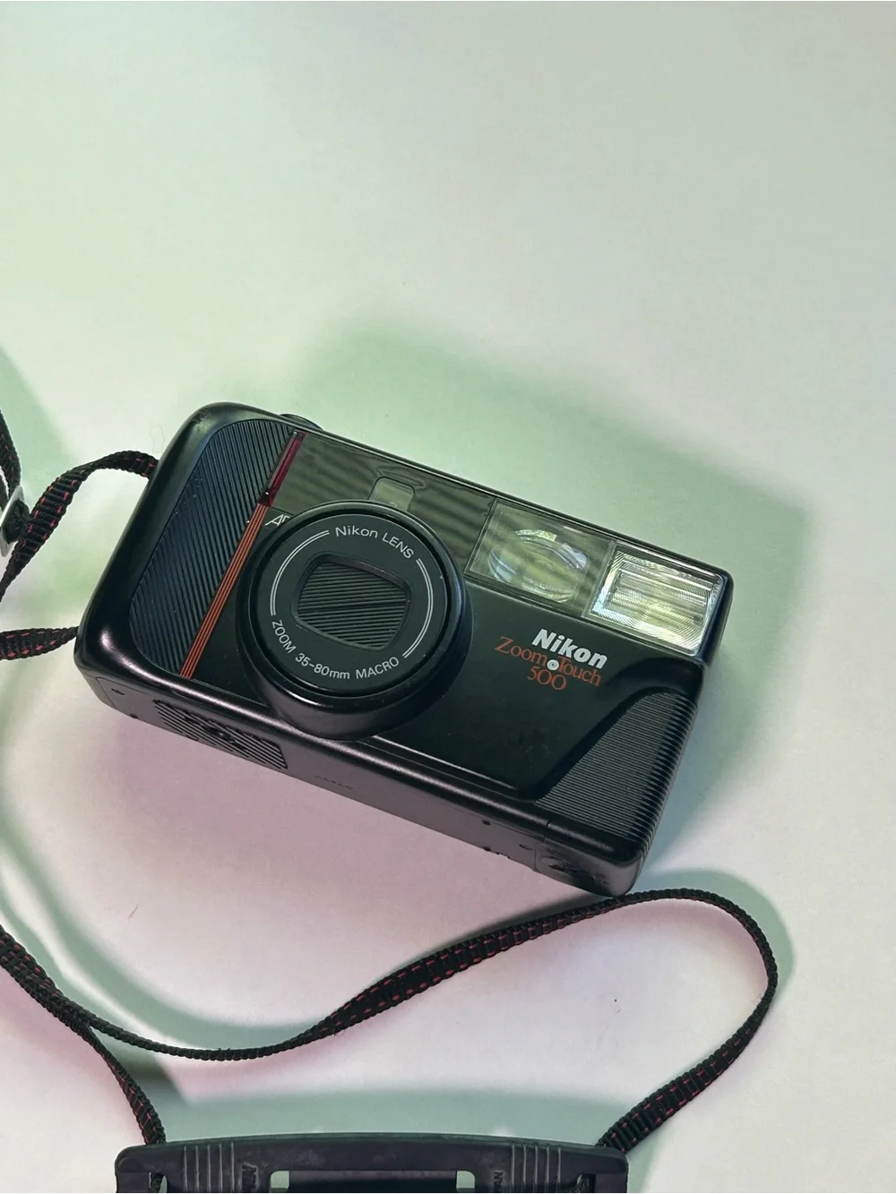Nikon Zoom Touch 500 Film Camera in Black with Red Accent